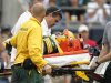 Green Bay Packers' Nick Collins is carted off the field after being injured during the fourth quarter of the Packers' 30-23 win over the Carolina Panthers in an NFL football game in Charlotte, N.C., Sunday, Sept. 18, 2011. (AP Photo/Bob Leverone)