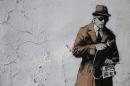 A detail from graffiti art is seen on a wall near the headquarters of Britain's eavesdropping agency, GCHQ, in Cheltenham, western England