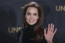 Director Jolie arrives to promote her film "Unbroken" in Berlin