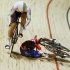 Britain's Victoria Pendleton, right, crashes during her semifinal against Australia's Anna Meares in the women's sprint at the Track Cycling World Championships in Melbourne, Australia, Friday, April 6, 2012. (AP Photo/Rick Rycroft)