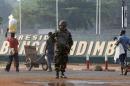 A Moroccan soldier from the peacekeeping forces secures a street in Bangui