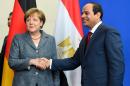German Chancellor Angela Merkel and Egyptian President Abdel Fattah al-Sisi shake hands after a press conference in Berlin, on June 3, 2015