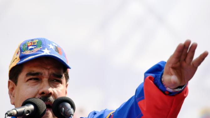 Venezuelan President Nicolas Maduro speaks during a May Day meeting in Caracas on May 1, 2015