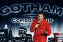 In a Nov. 15, 2006 file photo, Festival co-founder Dean Obeidallah performs at the Fourth Annual New York Arab-American Comedy Festival at the Gotham Comedy Club in New York. Arab-Muslim stand-up comedy is flourishing more than a decade after the terrorist attacks of Sept. 11. (AP Photo/Gary He)