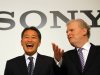 Sony Corp. President and Chief Executive Officer to be Kazuo Hirai, left, and current Sony CEO Howard Stringer have a light moment at a photo session following their press conference Thursday, Feb. 2, 2012. Battered by weak TV sales, a strong yen and production disruptions from flooding in Thailand, the Japanese electronics and entertainment company on Thursday reported a net loss of 159 billion yen ($2.1 billion) for the October-December quarter and projected it would lose even more money for the full fiscal year than it had expected three months ago. Sony announced Wednesday that Hirai will replace Stringer as CEO and president effective April 1. (AP Photo/Junji Kurokawa)