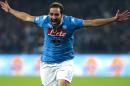 Napoli's Gonzalo Higuain celebrates after scoring a goal during a Serie A soccer match between Napoli and Inter Milan, at the San Paolo stadium in Naples, Italy, Monday, Nov. 30, 2015. (AP Photo/Salvatore Laporta)