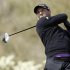 Spanish golfer Sergio Garcia hits off the 17th tee against Thailand's Thongchai Jaidee during the weather delayed first round of the WGC-Accenture Match Play Championship golf tournament in Marana