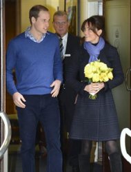 Britain's Prince William leaves the King Edward VII hospital with his wife Catherine, Duchess of Cambridge, London December 6, 2012. Prince William's pregnant wife Kate left the King Edward VII hospital in central London on Thursday where she had spent four days being treated for acute morning sickness. REUTERS/Paul Hackett