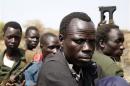South Sudan's rebels travel in a truck in a rebel-controlled territory in Jonglei State