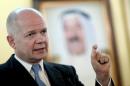 British Foreign Secretary William Hague speaks at a press conference in Kuwait city on December 6, 2013