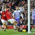 Arsenal's Mikel Arteta scores against Queens Park Rangers during their English Premier League soccer match in London