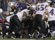 New England Patriots quarterback Tom Brady (12) dives over the middle to score on a one yard run during the second half of the AFC Championship NFL football game against the Baltimore Ravens Sunday, Jan. 22, 2012, in Foxborough, Mass. (AP Photo/Matt Slocum)