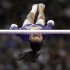 Gabby Douglas competes on the uneven bars during the final round of the women's Olympic gymnastics trials, Sunday, July 1, 2012, in San Jose, Calif. (AP Photo/Jae C. Hong)