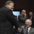 Greek Finance Minister Evangelos Venizelos, left, shakes hands with German Finance Minister Wolfgang Schaeuble during a round table meeting of eurozone finance ministers at the EU Council building in Brussels on Monday, Feb. 20, 2012. Eurozone governments will likely approve on Monday a long-elusive rescue package for Greece, saving it from a potentially calamitous bankruptcy next month, senior officials said. But finance ministers meeting in Brussels will have a few last issues to wrangle over, such as tighter controls over Greece's spending and further cuts to the country's debt load. (AP Photo/Yves Logghe)