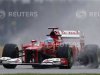 Ferrari Formula One driver Fernando Alonso of Spain completes a lap during fsecond practice for the British F1 Grand Prix at Silverstone