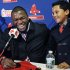 Boston Red Sox's David Ortiz laughs with his son D'Angelo, 8, during a baseball news conference, Monday, Nov. 5, 2012, at Fenway Park in Boston. Ortiz announced that he has finalized a $26 million, two-year contract, which includes bonuses that could raise the value to $30 million. (AP Photo/Elise Amendola)
