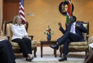 US Secretary of State Hillary Clinton (L) meets with Kenya's Prime Minister Raila Odinga at the Prime Ministers office, in Nairobi, Kenya. (AFP Photo/Jacquelyn Martin)