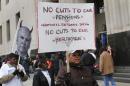 Protesters demonstrate against cuts in Detroit city workers' pensions and healthcare, in Detroit