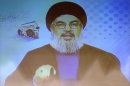 Hezbollah leader Sheik Hassan Nasrallah speaks via video during a conference, held in a southern suburb of Beirut, Lebanon, Thursday May, 9, 2013. Nasrallah said Syria will supply `game-changing' weapons to the Lebanese militant group. (AP Photo/Hussein Malla)