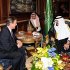 In this photo releases by the Saudi Press Agency, British Prime Minister David Cameron, left, meets with Saudi Arabia's King Abdullah, right, in Jiddah, Saudi Arabia, Tuesday, Nov. 6, 2012. British Prime Minister David Cameron suggested Tuesday that Syria's president Bashar Assad could be allowed safe passage out of the country if that option would guarantee an end to the nation's civil war. (AP Photo/Saudi Press Agency)