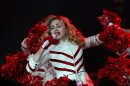 FILE - U.S. singer Madonna performs during her concert at concert Hall in St. Petersburg, Russia, in this Thursday, Aug. 9, 2012 file photo. A Russian court has dismissed a lawsuit that sought millions of dollars in damages from Madonna for allegedly traumatizing minors by speaking up for gay rights during a concert in St. Petersburg. (AP Photo/ Olga Maltseva, File)