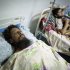 Revolutionary fighter Ismahil Ohm, 32, who was wounded in Sirte, Libya during the last assault toward the loyalist stronghold, lies in bed at a hospital in Misrata, Monday, Sept. 26, 2011. Anti-Gadhafi fighters launched their offensive against Sirte nearly two weeks ago, but have faced fierce resistance from loyalists holed up inside the city. After a bloody push into Sirte again over the weekend, revolutionary fighters say they have pulled back to plan their assault and allow civilians more time to flee. (AP Photo/Manu Brabo)