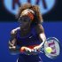 Serena Williams of the U.S. hits a return to Edina Gallovits-Hall of Romania during their women's singles match at the Australian Open tennis tournament in Melbourne