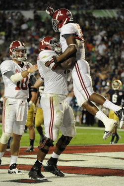 Crimson Tide wide receiver Amari Cooper celebrates his touchdown catch. (USA Today Sports)