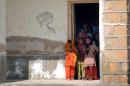 Pakistani girls are seen at an empty government school in Chancher Redhar, in the southern district of Thatta, on November 20, 2013