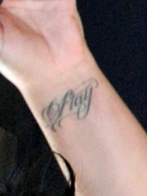 Tattoo on Demi Lovato's left wrist Hot Shots Worldwide Splash Tattoo on 