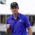 Justin Rose, of England, pumps his fist after his putt on the 18th hole during the final round of the Cadillac Championship golf tournament on Sunday, March 11, 2012, in Doral, Fla. (AP Photo/Lynne Sladky)