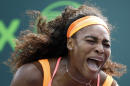 Serena Williams celebrates after winning a game against Monica Niculescu, of Romania, during their match at the Miami Open tennis tournament in Key Biscayne, Fla., Saturday, March 28, 2015. (AP Photo/J Pat Carter)