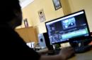 An Aswaja TV crew edits a television program that will help promote a moderate form of Islam in Indonesia, the world's most populous Muslim-majority country