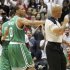 Boston Celtics' Avery Bradley, center, puts his arm around Rajon Rondo, rear left, and walks him off the court as he is ejected from the game by referee Marc Davis late in the fourth quarter of Game 1 of a first-round NBA basketball playoff series against the Atlanta Hawks, Sunday, April 29, 2012, in Atlanta. The Hawks won 83-74. (AP Photo/Atlanta Journal-Constitution, Curtis Compton)  MARIETTA DAILY OUT; GWINNETT DAILY POST OUT