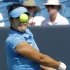 Li Na, from China, eyes a backhand during a match against Lucie Safarova, from the Czech Republic, at the Western & Southern Open, Tuesday, Aug. 16, 2011 in Mason, Ohio. (AP Photo/Al Behrman)