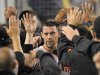 San Francisco Giants' Chris Stewart is congratulated by teammates after he scored on a double by Justin Christian during the fourth inning of a baseball game against the Los Angeles Dodgers, Wednesday, Sept. 21, 2011, in Los Angeles. (AP Photo/Mark J. Terrill)