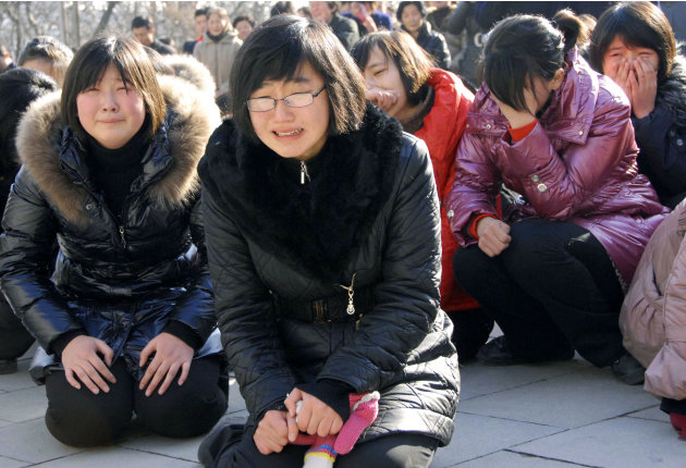 North Korean women cry after learning death of their leader Kim Jong Il on Monday, Dec. 19, 2011 in Pyongyang, North Korea. Kim died on Saturday, Dec. 17, North Korean state media announced Monday. (A