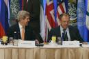 US Secretary of State John Kerry (left) talks to Russian Foreign Minster Sergei Lavrov before a meeting in New York on securing a ceasefire in Syria, on December 18, 2015