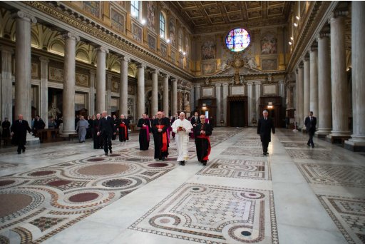Newly elected Pope Francis I (C), Cardinal Jorge Mario Bergoglio of Argentina, walks in the 5th-century Basilica of Santa Maria Maggiore during a private visit in Rome