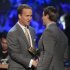 Indianapolis Colts' Peyton Manning, left, presents the AP MVP Player of the Year to Green Bay Packers' Aaron Rodgers during the inaugural NFL Honors show Saturday, Feb. 4, 2012, in Indianapolis.The New York Giants will face the New England Patriots in the NFL football's Super Bowl XLVI in Indianapolis on Feb. 5. (AP Photo/Marcio Sanchez)