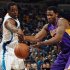 Al-Farouq Aminu of the New Orleans Hornets fights for a ball with Devin Ebanks of the Los Angeles Lakers