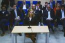 Spain's Princess Cristina appears on a television screen in a press room as she is questioned by a prosecutor in landmark corruption trial in Palma de Mallorca, on the Spanish Balearic Island of Mallorca on March 3, 2016