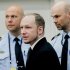 Defendant Anders Behring Breivik, centre, seen during the fourth day of proceedings in court in Oslo, Norway, Thursday April 19, 2012.  Confessed mass killer Anders Behring Breivik testified Thursday that he had planned to capture and decapitate former Norwegian Prime Minister Gro Harlem Brundtland during his shooting massacre on Utoya island. (AP Photo / Erlend Aas)