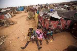 Families outside their shelters in Zam Zam camp for&nbsp;&hellip;