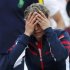 Clijsters of Belgium reacts after her defeat to Robson of Britain in their women's singles match at the U.S. Open tennis tournament in New York