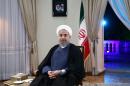 Iran and Turkey must work with one another to root out the threat of extremism in the region, President Hassan Rouhani, pictured in Tehran on August 2, 2015, told his Turkish counterpart