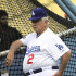 Tom Lasorda stands at the batting cage before the Dodgers' baseball game against the San Francisco Giants, Thursday, Sept. 22, 2011, in Los Angeles. His return is nearly 35 years to the day that he took over as manager of the team. Rookie manager Don Mattingly asked Lasorda to serve as an honorary coach for the team's home finale being played on Lasorda's 84th birthday. (AP Photo/Mark J. Terrill)