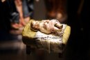 Una figurita del niño Jesús expuesta en una muestra de belenes en Washington