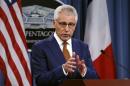 U.S. Secretary of Defense Hagel speaks during a joint news conference with French Minister of Defense Le Drian following their meeting at the Pentagon in Washington