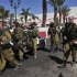 Israeli soldiers guard the area near a hotel at the Red Sea resort city of Eilat